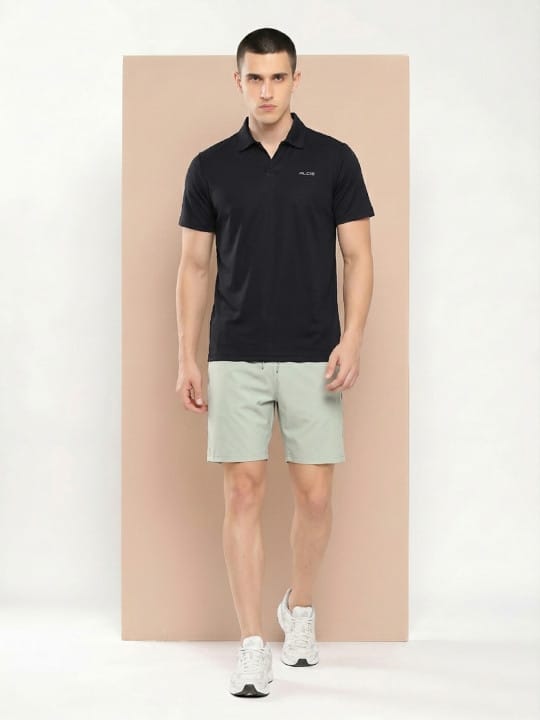 
                    
                      Alcis black performance polo T-shirt for men with breathable polyester fabric for gym and training.
                    
                  