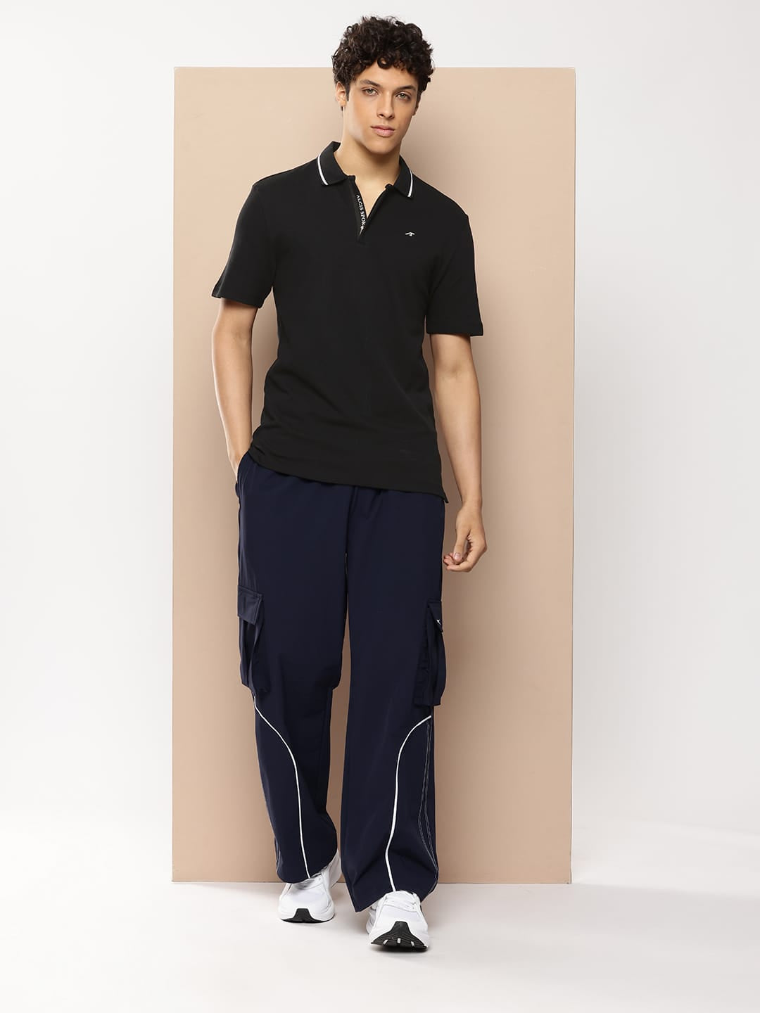 Alcis black slim fit polo T-shirt for men with hidden zip closure for sports and casual wear.