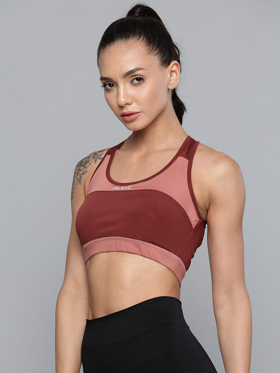 
                    
                      Alcis burgundy pink workout bra for women featuring breathable knitted fabric for yoga, training and active wear.
                    
                  