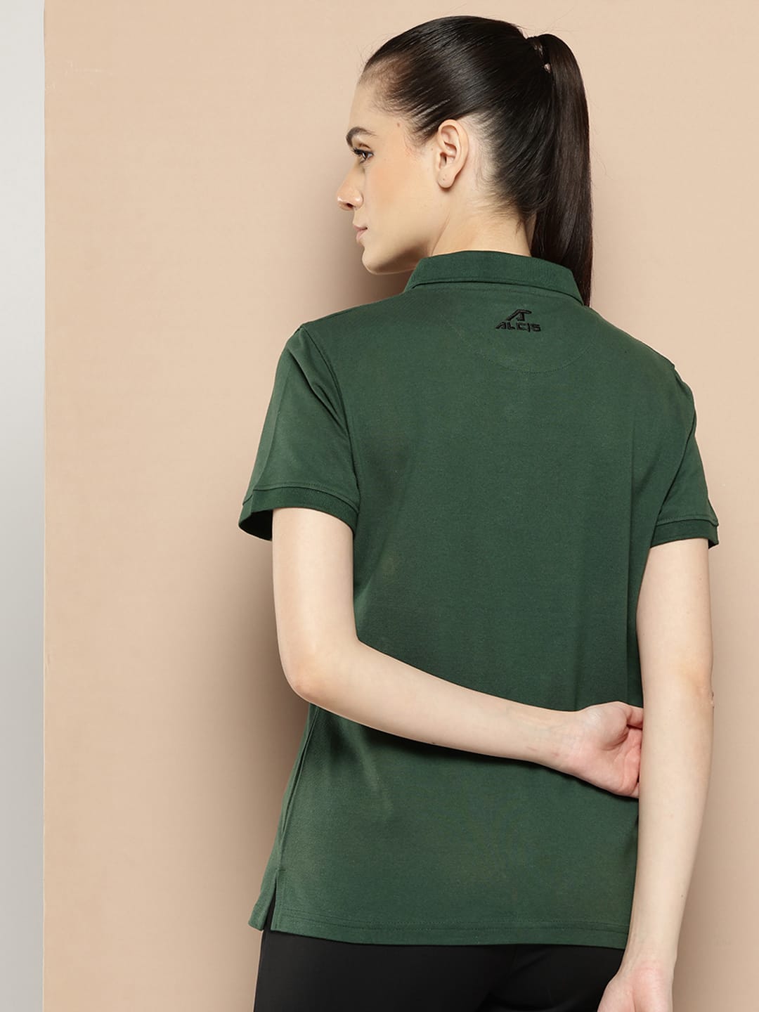Alcis green women's polo T-shirt with regular fit for sports, travel and everyday comfort.