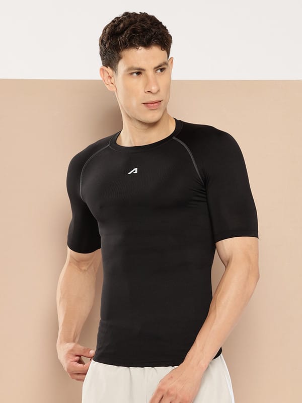 Alcis men black Power Skin compression T-shirt with slim fit and breathable poly spandex fabric for training.