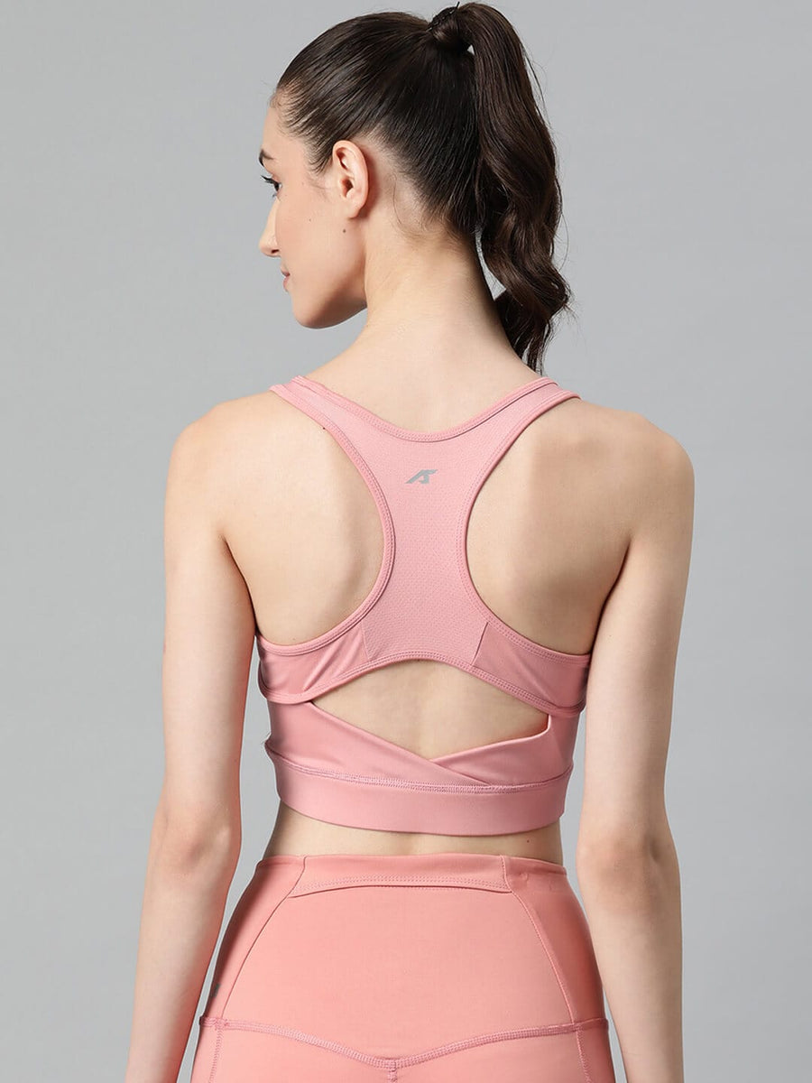 
                    
                      Alcis pink sleeveless workout bra for women with breathable polyester spandex fabric for fitness and cardio.
                    
                  