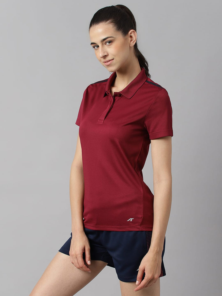 
                    
                      Alcis red plum training polo T-shirt for women made with breathable 100% polyester fabric for workouts.
                    
                  