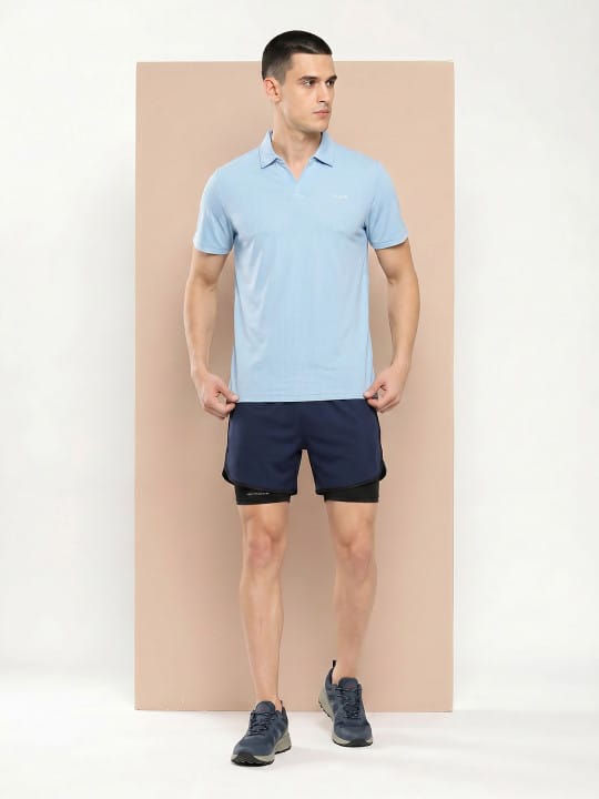 Alcis sky blue performance polo T-shirt for men with breathable polyester fabric for training and everyday comfort.