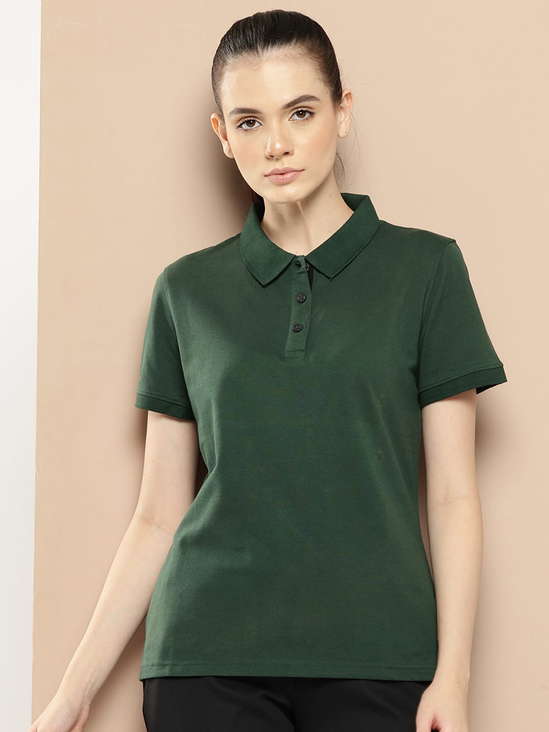 Alcis women green Victory polo T-shirt with regular fit and breathable cotton polyester fabric.