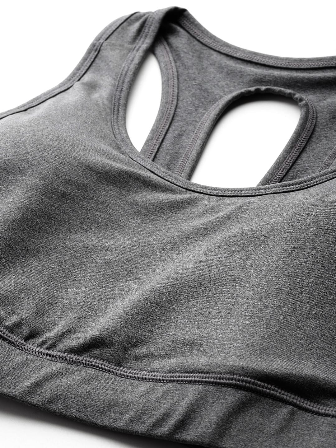 Alcis women grey sports bra top with flexible performance fabric for fitness, training and active lifestyle.