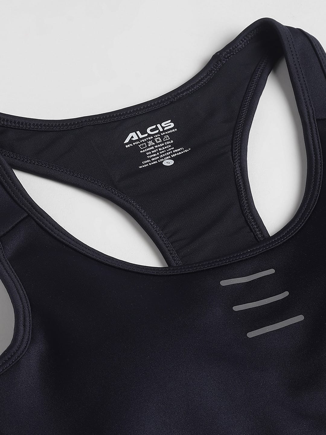 Alcis women navy training sports bra with round neck, high support and flexible performance fabric for workouts.