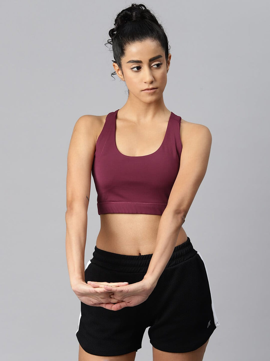 
                    
                      Alcis women red non-wired workout bra with Drytech+ and Anti-Statix technology for gym training.
                    
                  