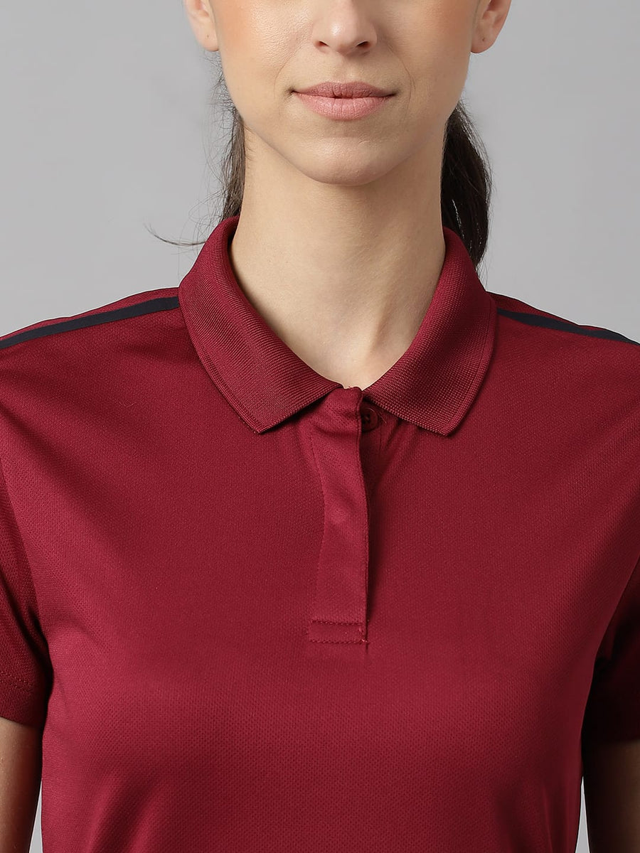 Alcis women red plum Wonder training polo T-shirt with Anti-Statix and Drytech+ technology.
