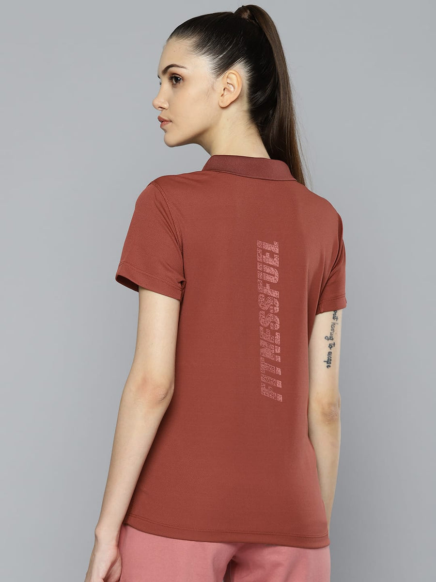 
                    
                      Alcis women wine polo T-shirt with moisture-friendly polyester fabric for workouts and everyday comfort.
                    
                  