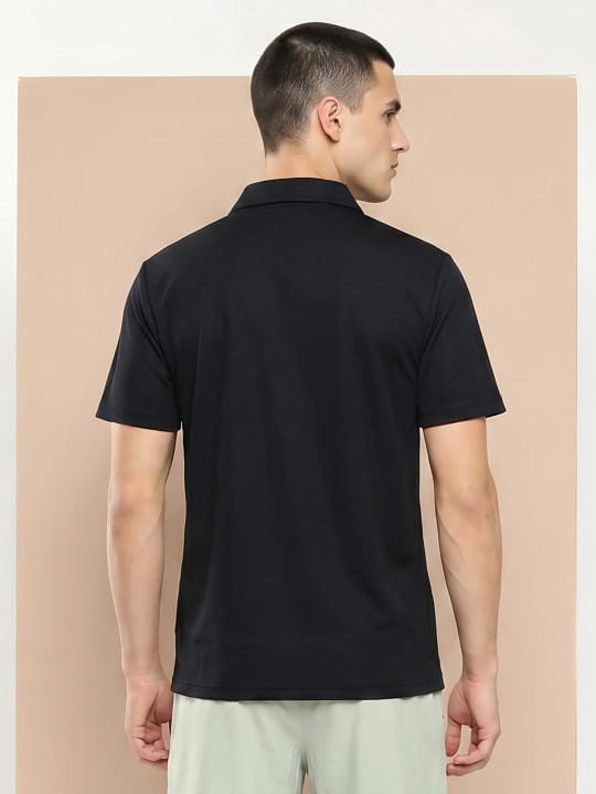 Men's black Cloud Polo by Alcis featuring a minimal V-neck design for sports and casual wear.
