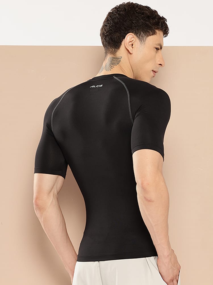 Men's black compression tee by Alcis featuring stretch fabric for gym workouts, running and fitness.