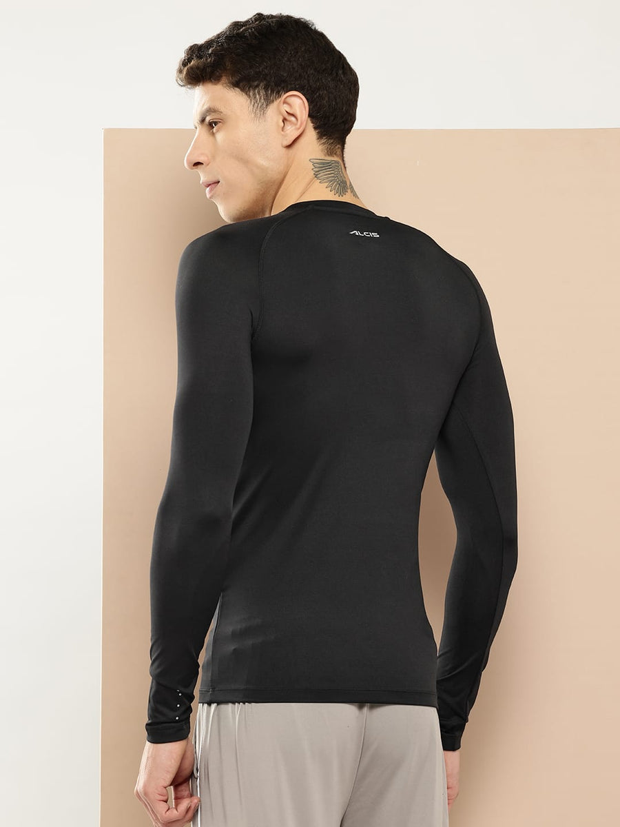 Men's black compression tee by Alcis made from breathable poly lycra fabric for workouts and fitness.