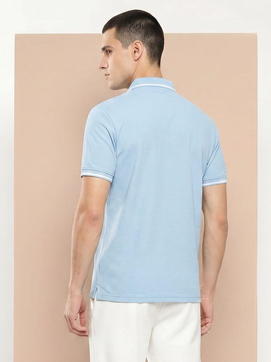 Men's sky blue slim fit polo by Alcis made from lightweight 100% polyester fabric for sports and casual wear.