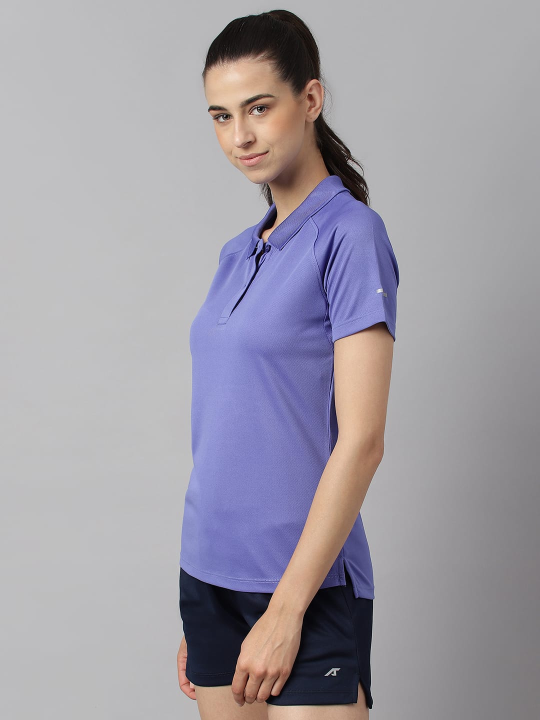 Women's Iris Bloom slim fit polo T-shirt by Alcis with Soft-Touch, Airvent-X and Light-X performance fabric.