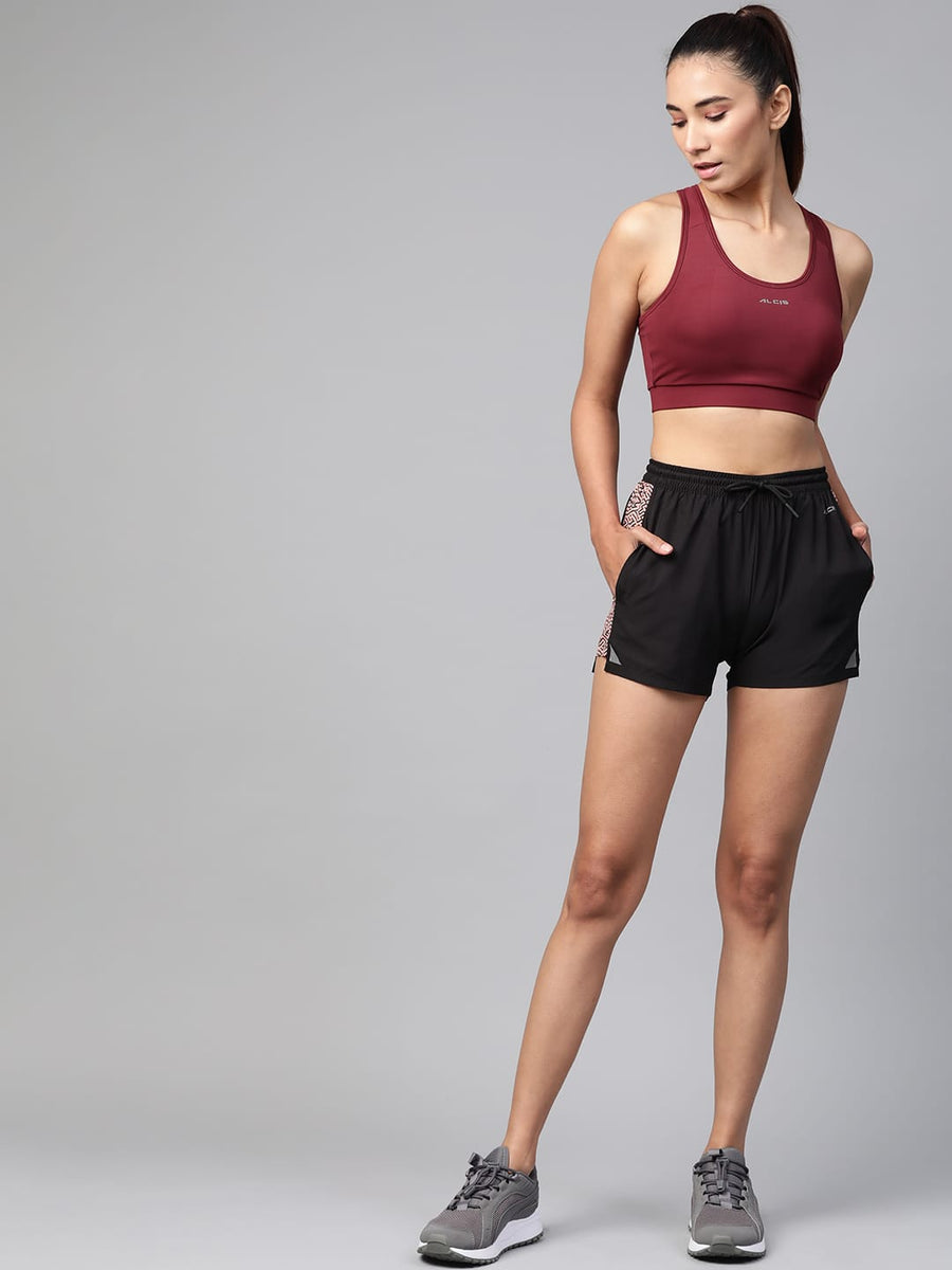 
                    
                      Women's maroon lightly padded fitness bra with solid design for gym, yoga and active training by Alcis.
                    
                  