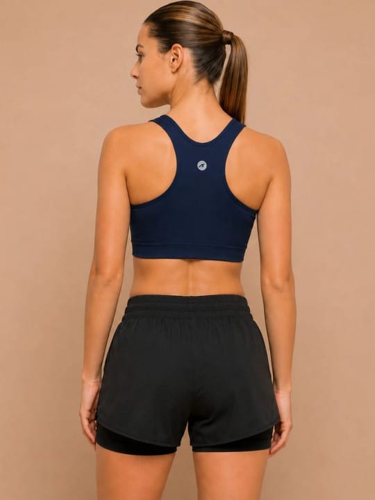 Women's navy V-neck sports bra by Alcis with in-built support, medium coverage and stretch fabric.