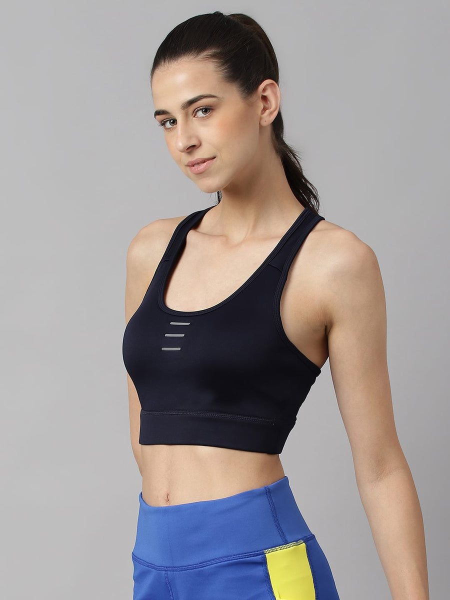 Women's navy slim fit sports bra by Alcis featuring Drytech+, Airvent-X and Stretch-X technology.