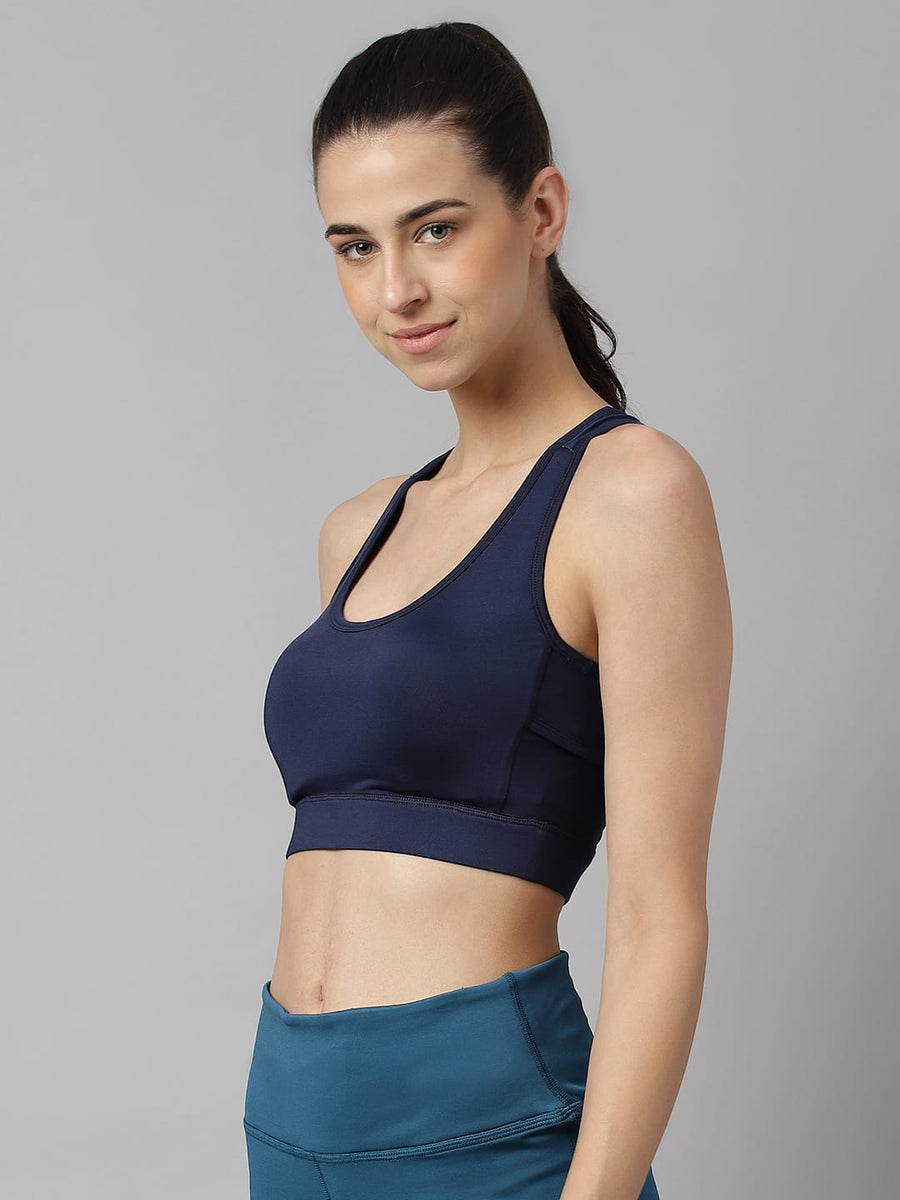 Women's navy slim fit sports bra by Alcis featuring Stretch-X, Drytech+ and Soft-Touch fabric technology.