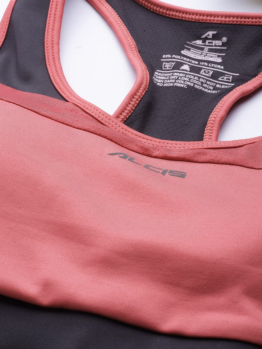 Women's pink medium support sports bra by Alcis featuring full coverage, 360 degree support and styled back design.