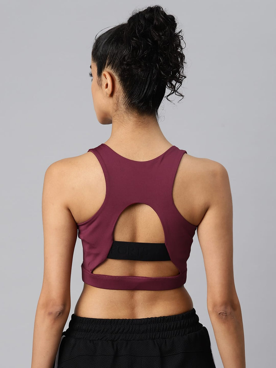 
                    
                      Women's red slim fit sports bra by Alcis featuring stretch fabric and Soft-Touch comfort for workouts.
                    
                  