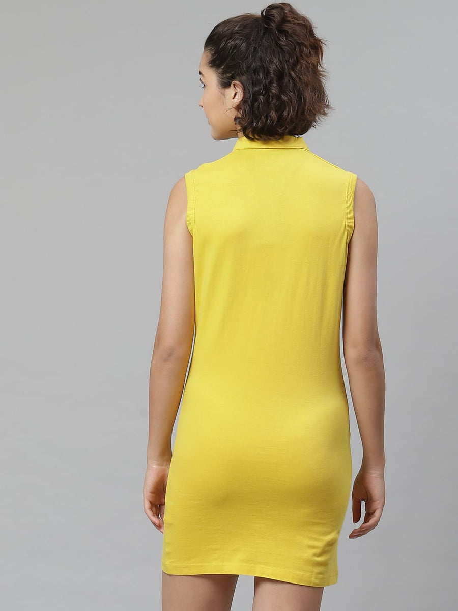 Women's yellow cotton sports T-shirt dress by Alcis featuring breathable fabric and round neck style.