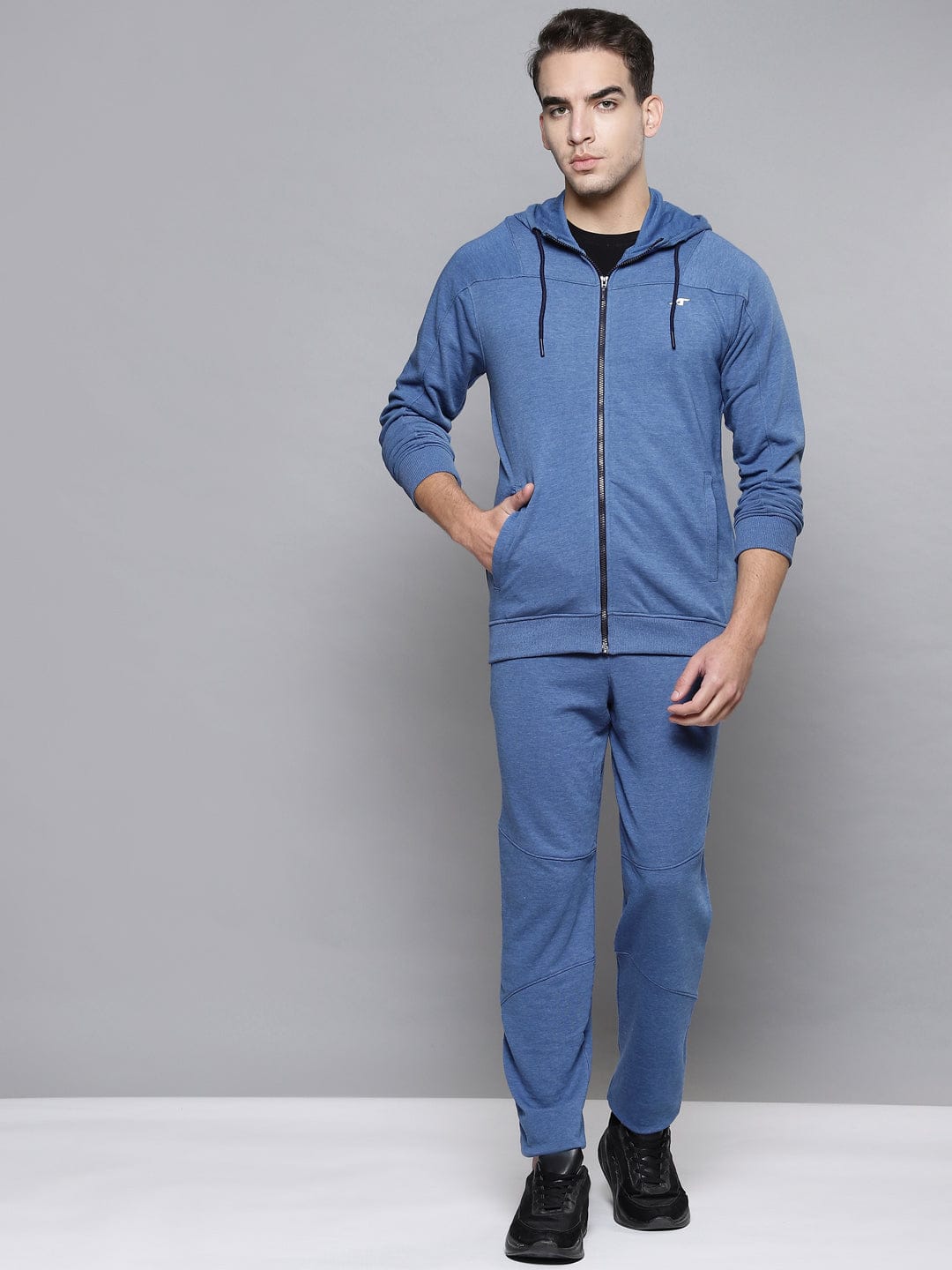 Alcis men blue solid tracksuit with hooded zip-up jacket and regular fit track pants for sports.