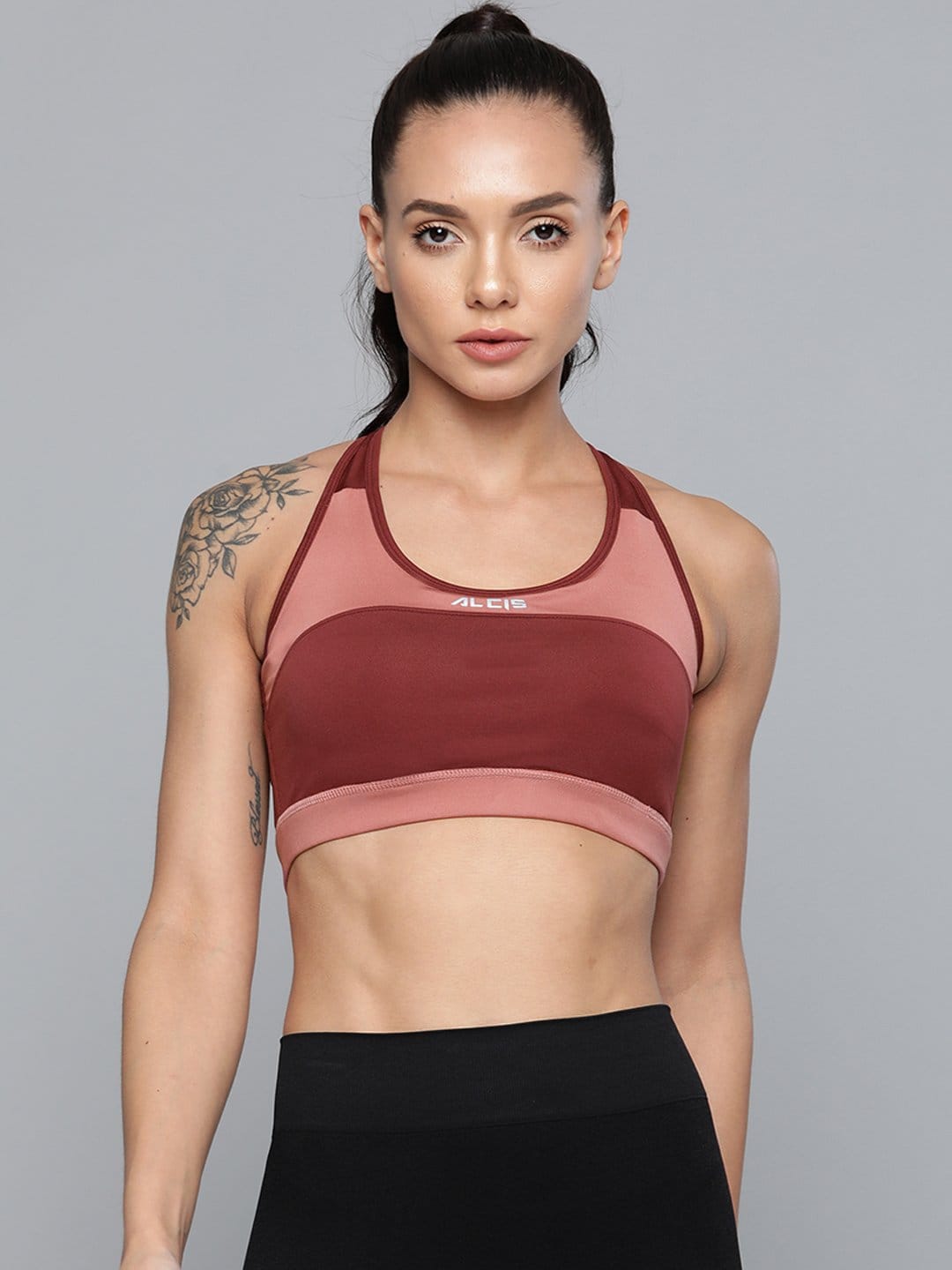 Alcis women burgundy pink colourblocked full coverage lightly padded workout bra for gym and fitness.