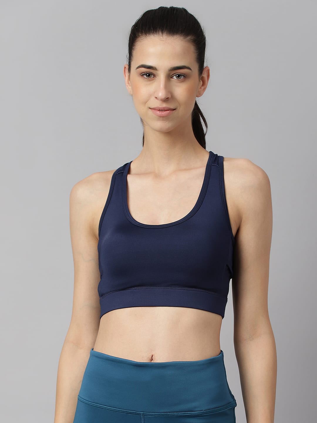 Alcis women navy high impact sports bra with anti-static technology for intense gym and fitness workouts.