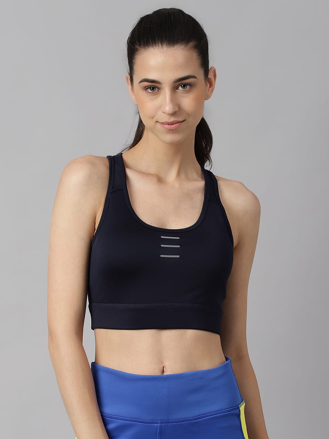 Alcis women navy high support sports bra with anti-static fabric for gym training and fitness workouts.