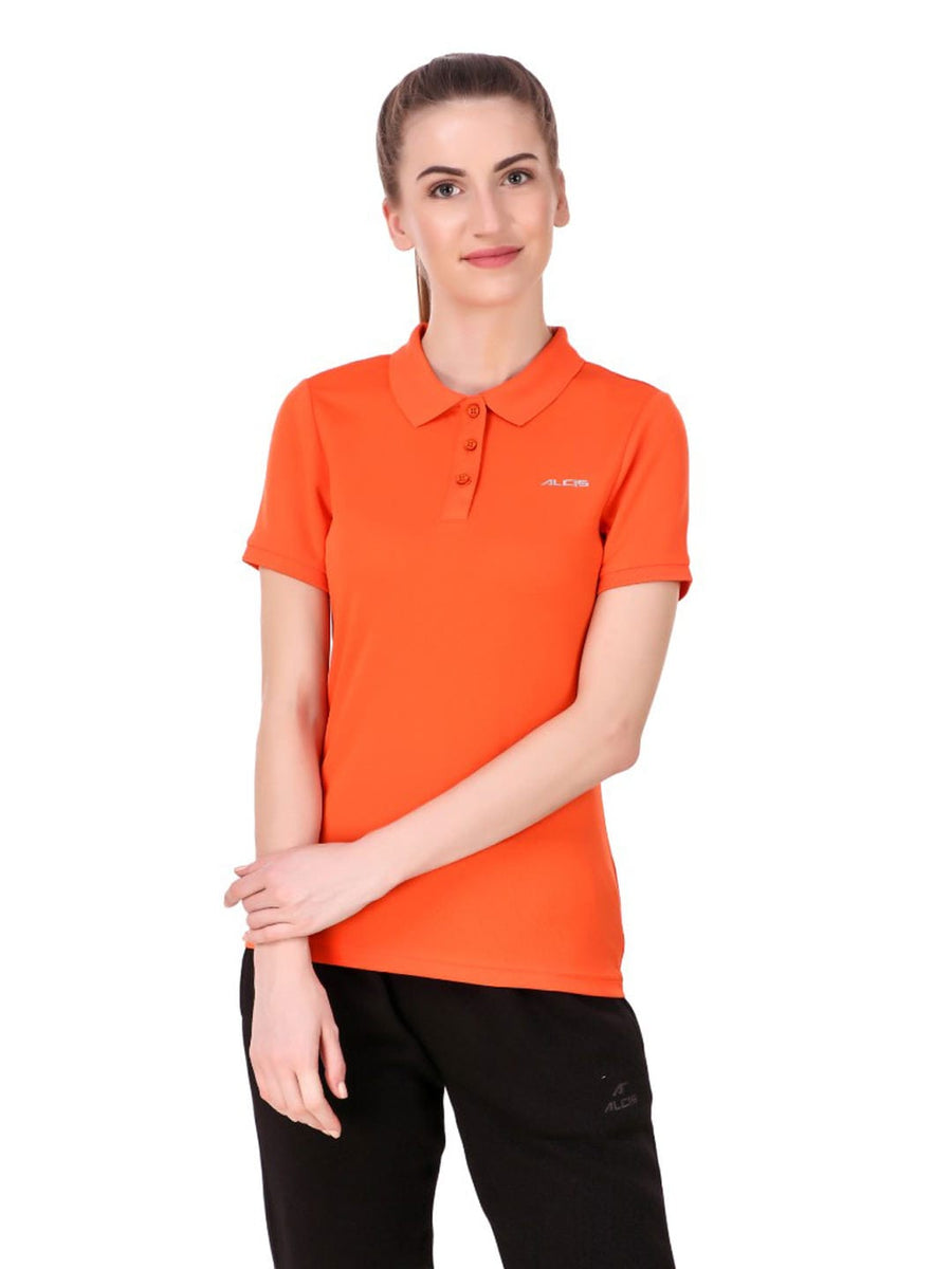 Alcis women orange solid polo collar sports T-shirt with regular fit and breathable polyester fabric.