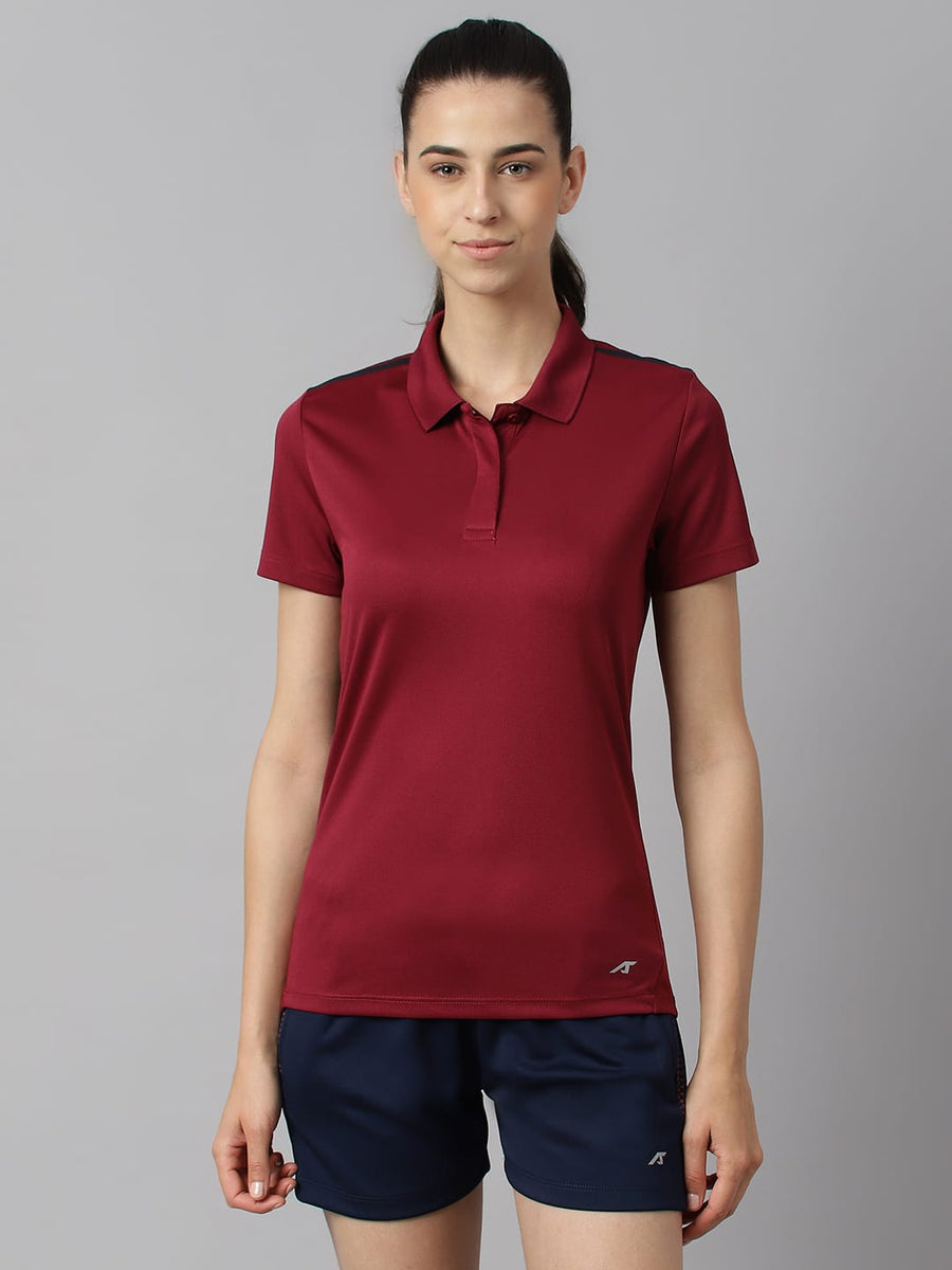 Alcis women red plum Wonder training polo T-shirt with Anti-Statix and Drytech+ technology.